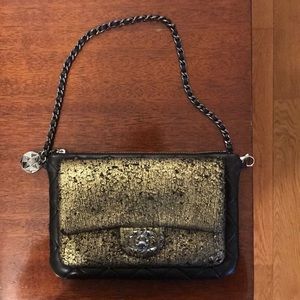 Chanel black leather and gold metallic clutch